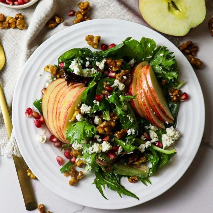 Plate of apple harvest salad with candied walnuts